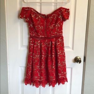 Off the shoulder, bright red lace dress